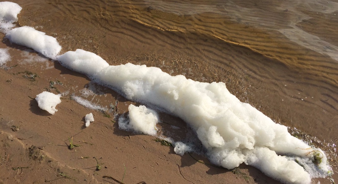 PFAS foam in Van Ettan Lake in Oscoda, Michigan near the former Wurtsmith Air Force Base.